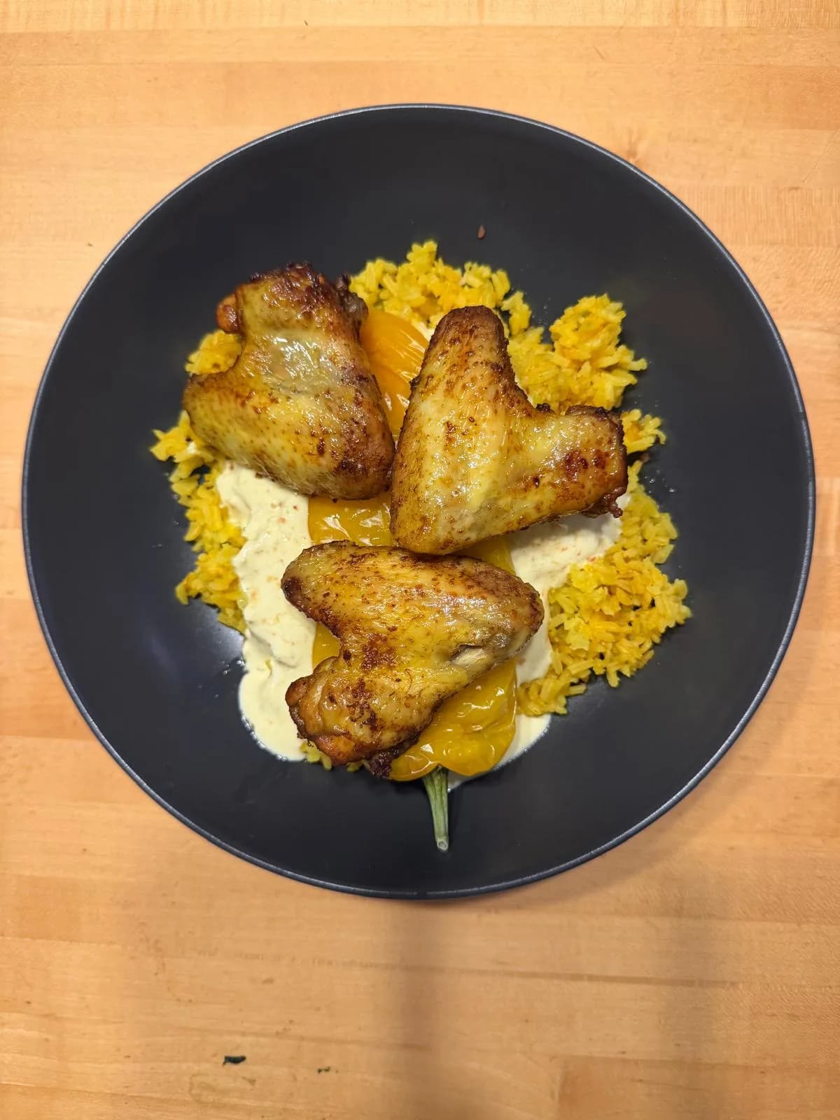 Curry Chickenwings auf Reis